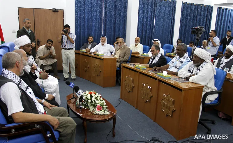Members of the Sudanese and South African delegation meets with the spokesman of Palestinian Parliament, Ahmed Bahr during their visit to the Legislative Council headquarters in Gaza city on August 28, 2011. Photo by Moh...