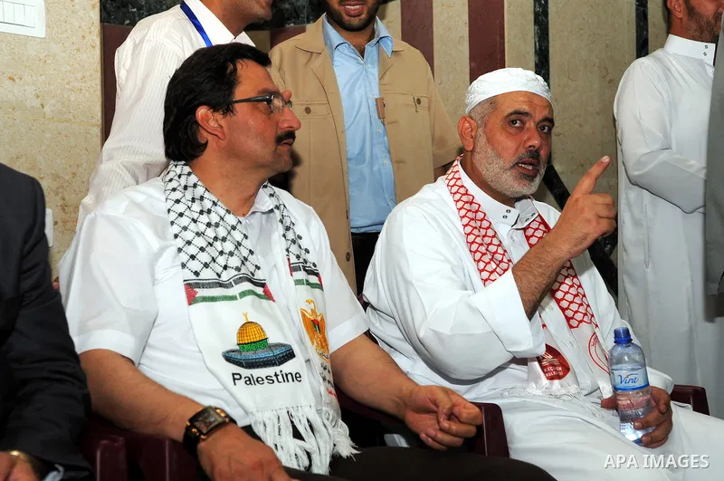 Palestinian Prime Minister, Ismail Haniya receives Turkey delegation in Gaza city on Aug. 29, 2011. calling them to continue to support the Palestinian people. Photo by Ahmed Shaat