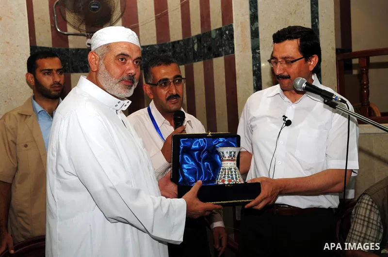 Palestinian Prime Minister, Ismail Haniya receives Turkey delegation in Gaza city on Aug. 29, 2011. calling them to continue to support the Palestinian people. Photo by Ahmed Shaat