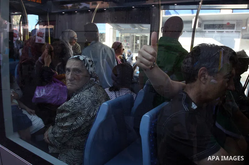 Palestinian and israeli Passengers ride a light rail train, Ten days after opened to the public in Jerusalem, on Aug. 29, 2011. The Jerusalem municipality said that a long-awaited light rail system is beginning operation...