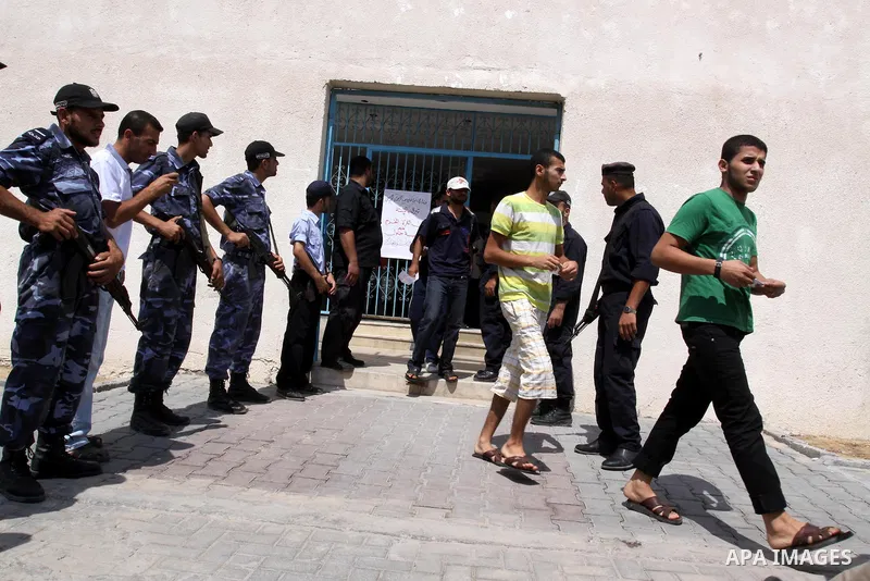Palestinian prisoners prepare to be freed from a Hamas-run jail in Gaza City on Aug. 29, 2011. Palestinian Hamas police released prisoners because of the approaching Eid al-Fitr. Photo by Mohammed Asad