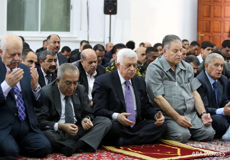 Palestinian president Mahmoud Abbas (Abu Mazen) attends the prayer of Eid al-Fitr in the West Bank city of Ramallah August 30, 2011. Eid al-Fitr marks the end of the Muslim holy month of Ramadan. Photo by Thaer Ganaim