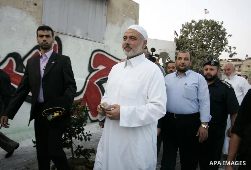 Ismail Haniya, Palestinian Prime Minister in the Gaza Strip, walks after an open air morning prayer to celebrate Eid al-Fitr in Khan Yunis town the southern Gaza Strip on August 30, 2011. The Palestinian Territories, alo...