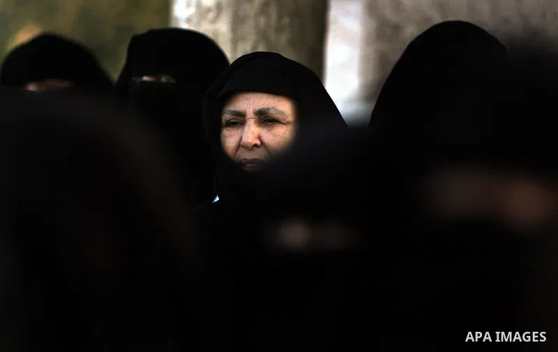 Palestinians attend an open air morning prayer to celebrate Eid al-Fitr in Khan Yunis town the southern Gaza Strip on August 30, 2011. The Palestinian Territories, along with other neighboring and Gulf states, announced...
