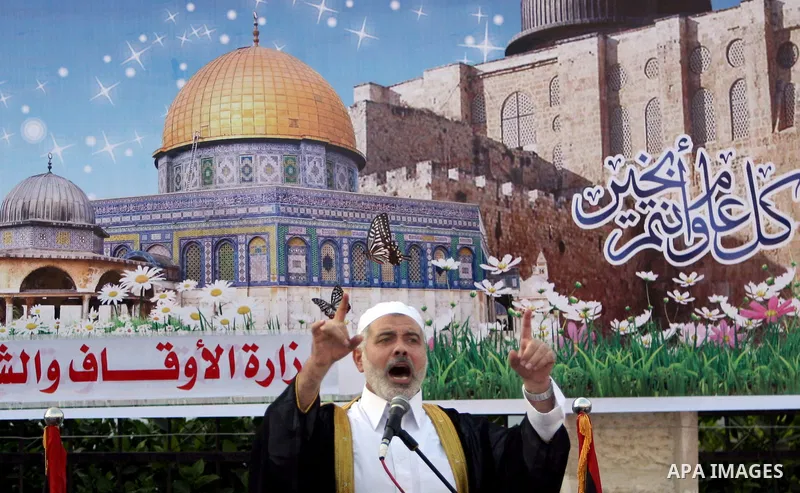 Ismail Haniya, Palestinian Prime Minister in the Gaza Strip, addresses the public during an open air morning prayer to celebrate Eid al-Fitr in Khan Yunis town the southern Gaza Strip on August 30, 2011. The Palestinian...