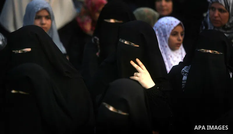 Palestinians attend an open air morning prayer to celebrate Eid al-Fitr in Khan Yunis town the southern Gaza Strip on August 30, 2011. The Palestinian Territories, along with other neighboring and Gulf states, announced...