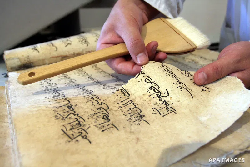 Palestinians work to rewrite manuscripts in the Manuscript Center at Al-Aqsa Mosque in Jerusalem on September 2, 2011 .The Manuscript Center Aqsa Mosque first of its kind in the Middle East and fourth in the world, as cl...