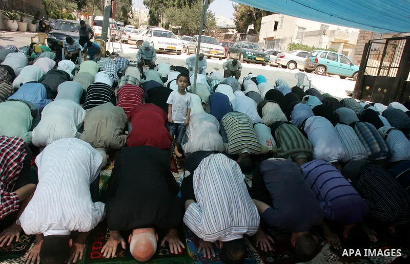 Palestinians attend Friday prayers in front of the red cross headquarters on Sept. 2, 2011 in the mostly Arab Jerusalem neighborhood of Sheikh Jarrah. Photo by Mahfouz Abu Turk