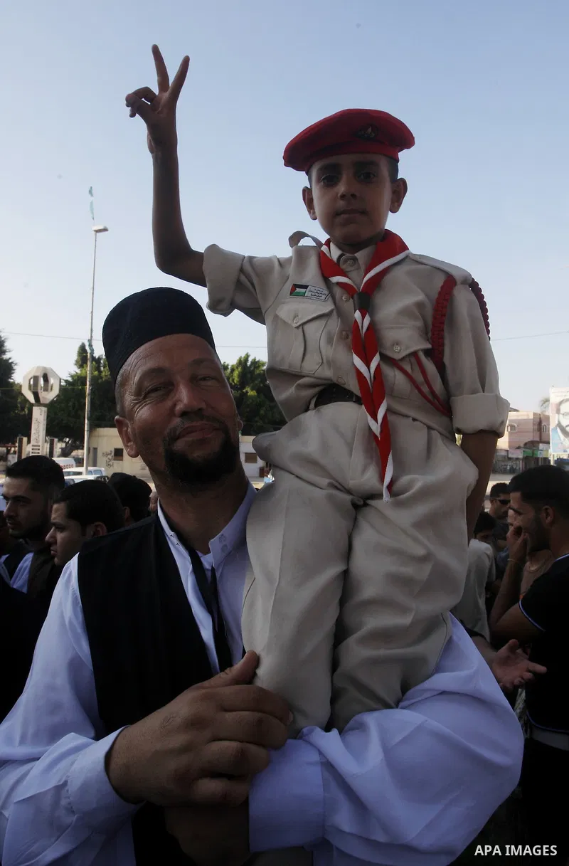 Members of ''Miles of Smiles" convoy and other pro-Palestinian activists attend the inauguration ceremony of the memorial for Egyptian soldiers who killed by Israeli army on the border between Israel and Egypt's Sinai Pe...