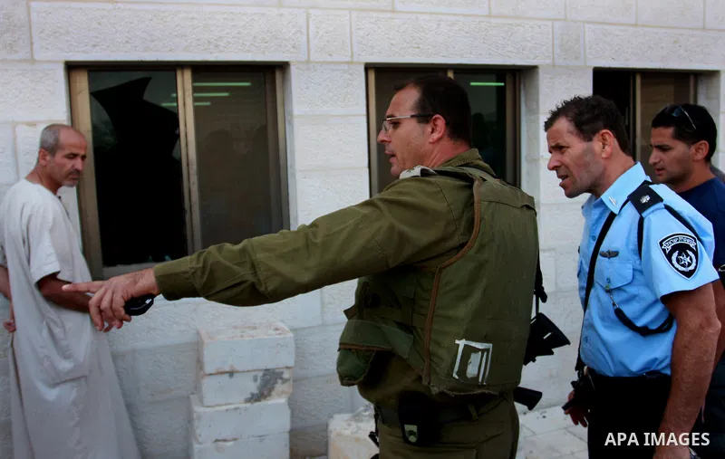 Israeli border police inspects a partially burnt and vandalized mosque in the West Bank village of Qusra near the West Bank City of Nablus .Monday, Sept. 5,2011. set fire to a mosque near Nablus in the northern West Bank...
