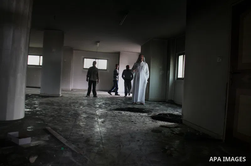Palestinians inspect the damage inside a mosque torched and vandalized by arsonists in the West Bank village of Qusra, near Nablus, on Sept. 5, 2011. Arsonists tossed tow tires into the first floor study hall of a new mo...