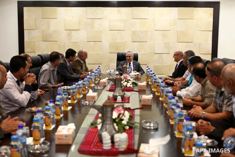 Palestinian Prime Minister, Salam Fayyad receives economic and legal, social and civil figures, in the province of Jenin in the West Bank on Sep. 6, 2011. Photo by Mustafa Abu Dayeh