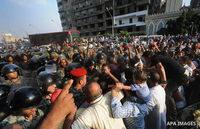 Egyptian protesters dismantle the concrete wall which was built in front of the Israeli embassy, in Cairo, Egypt, 09 September 2011. Security forces had built the wall in an attempt to secure the embassy after a series o...