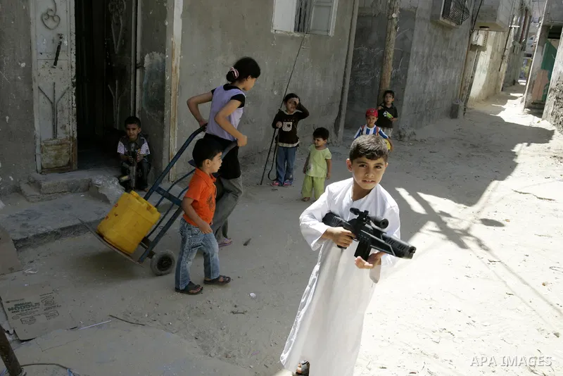 Palestinian children play in the street in the Rafah Refugee Camp, Southern Gaza Strip on September 13, 2011. A diplomatic showdown looms at the United Nations this month when Palestinian President Mahmoud Abbas is expec...