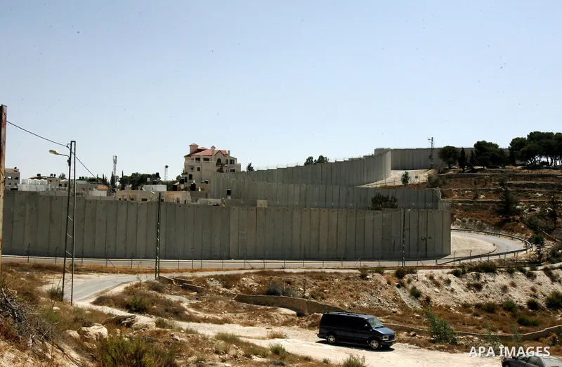 A view shows a section of Israel's controversial concrete barrier that separates the West Bank from Jerusalem on September 14, 2011. in Abu Dis, in Israeli-annexed east Jerusalem. Photo by Mahfouz Abu Turk
