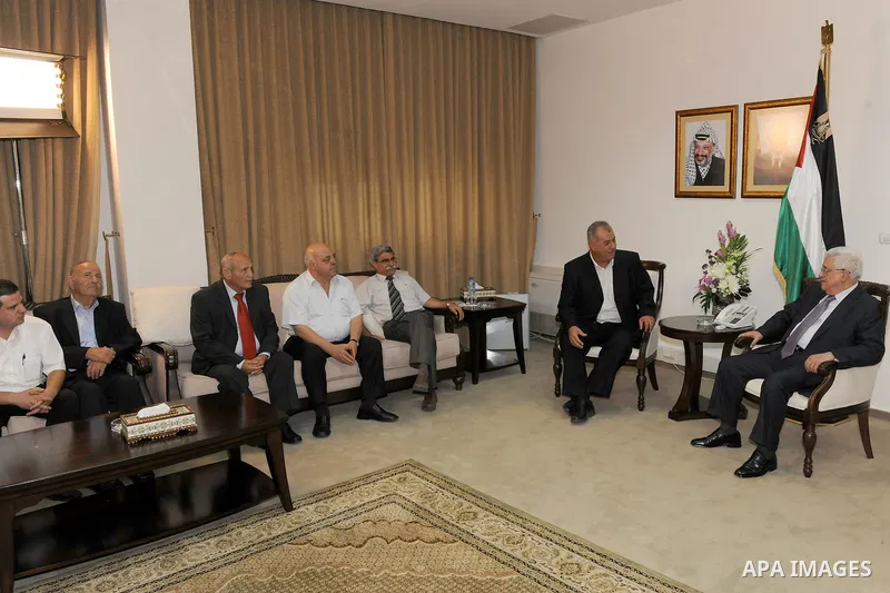 Palestinian President Mahmoud Abbas meets with a delegation from the Democratic Front for Peace and Equality headed by MK, Mohammed Baraka on September 16,2011 in the West Bank city of Ramallah. According to local source...