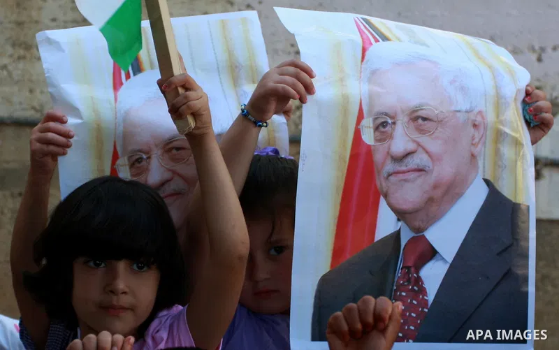 Palestinian children hold posters, in support with the Palestinian President Mahmoud Abbas, during a rally in the village of Azmut in the West Bank city of Nablus, on Sept. 18, 2011. Palestinian President Mahmoud Abbas i...
