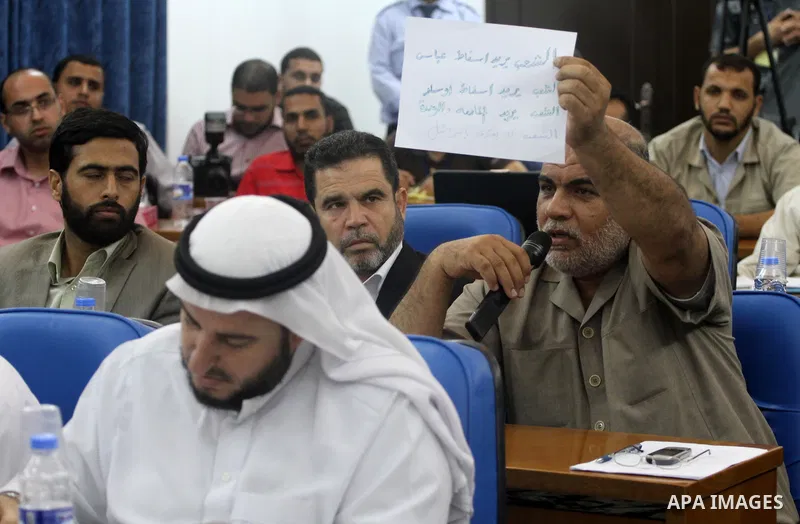 Palestinian Legislative Council members of the mass of change and reform, and a representative of the Hamas parliamentary bloc during a meeting in Gaza city on Sep. 18, 2011. Members of the Palestinian Legislative counci...