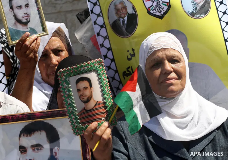 Palestinian Journalists and the relatives of prisoners take part during a protest in support with the journalist Samir Allawi, Al-Jazeera correspondent detained by the occupation, and calling for the release of the priso...