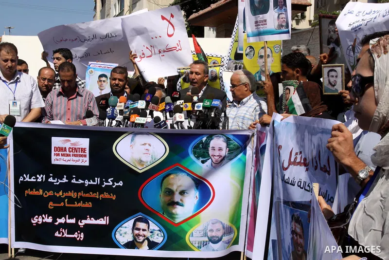 Palestinian Journalists and the relatives of prisoners delivers speech during a protest in support with the journalist Samir Allawi, Al-Jazeera correspondent detained by the occupation, and calling for the release of the...