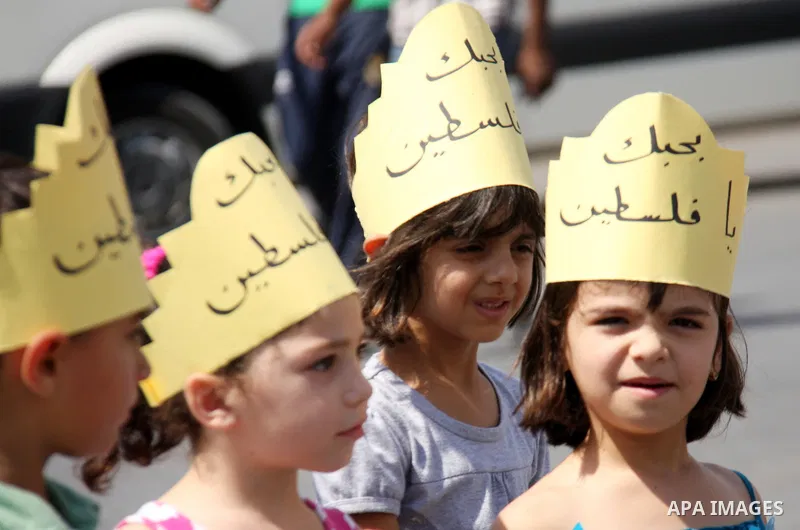 Palestinian schoolchildren take part in a rally in the West Bank city of Tulkarem, Monday, Sept. 19, 2011. Abbas is set to address the U.N. this week, planning to ask the world to recognize a Palestinian state. Photo by...