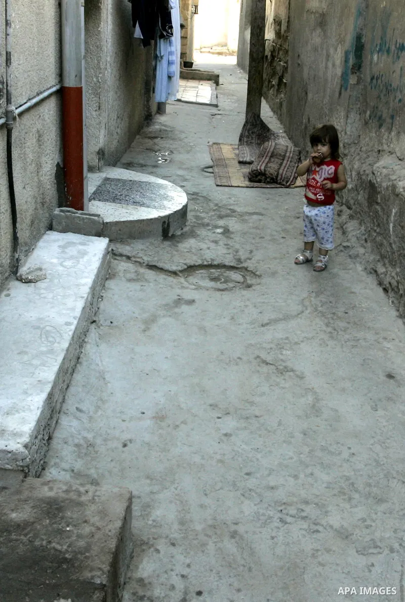 A Palestinian girl stands infront of her home in the Rafah refugee camp, southern Gaza Strip on Sep. 19, 2011. Attend the 66th General Assembly session of United Nations, which begins Tuesday, Sep. 20. The United States...