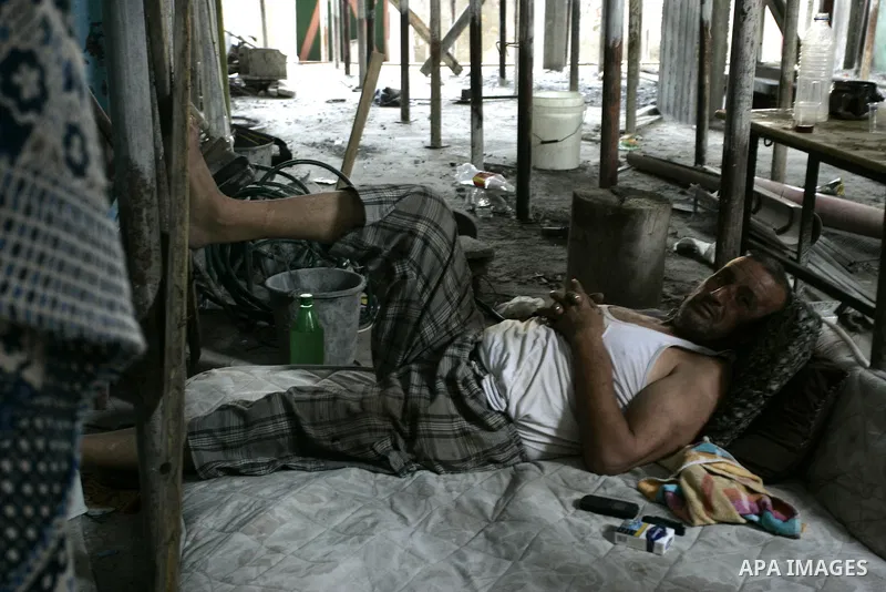 A Palestinian man sleeps on a mattress in the Rafah refugee camp, southern Gaza Strip on Sep. 19, 2011. Attend the 66th General Assembly session of United Nations, which begins Tuesday, Sep. 20. The United States and Eur...