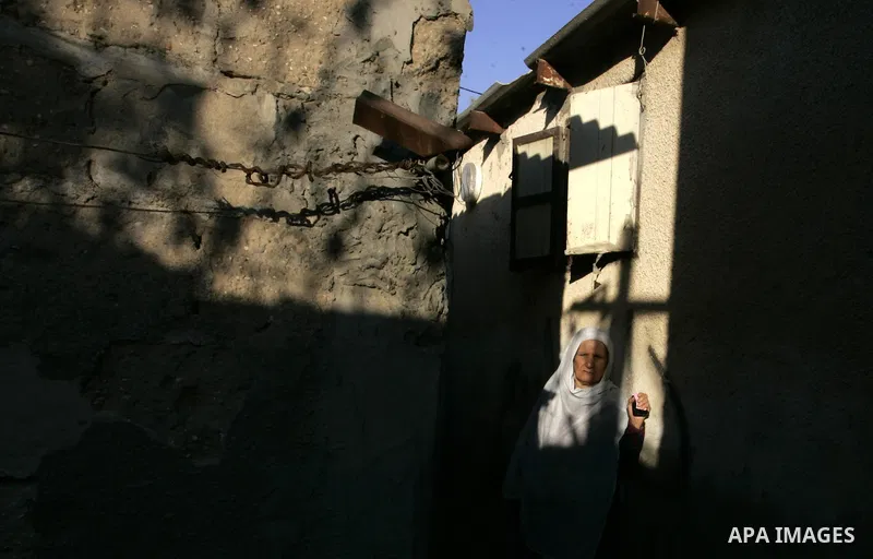 A Palestinian woman stands in the Rafah refugee camp, southern Gaza Strip on Sep. 19, 2011. Attend the 66th General Assembly session of United Nations, which begins Tuesday, Sep. 20. The United States and Europe scramble...