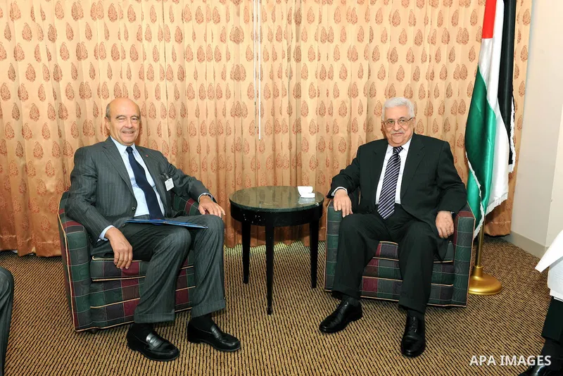 Palestinian President Mahmoud Abbas (Abu Mazen) meets Alain Juppe, French Foreign Minister in New York on Sep. 19, 2011. Photo by Mufeed Abu Hasnah