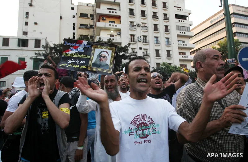 Hundreds of Egyptian activists marched in downtown Cairo to protest against the reassertion of the Emergency Law in the wake of the attack on the Israeli Embassy on 9 September. Egyptian activists marching through the st...