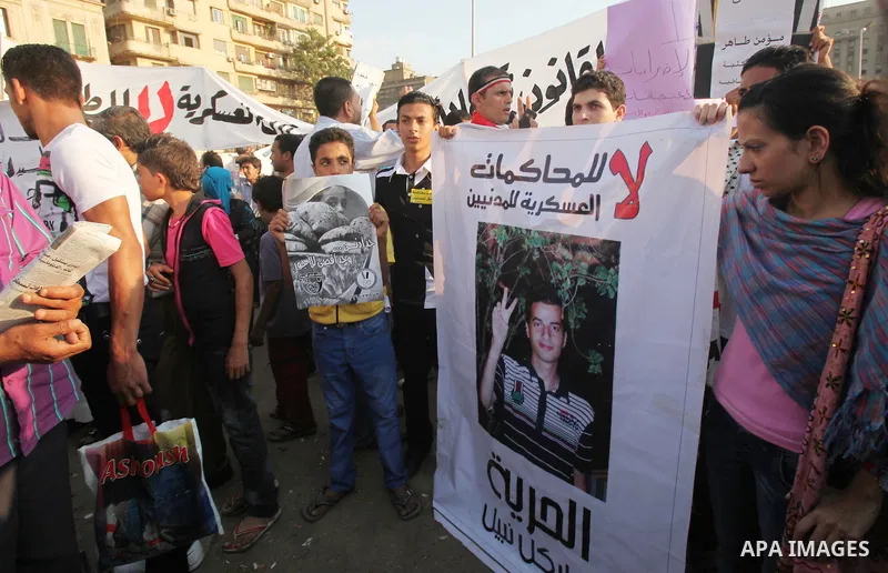 Hundreds of Egyptian activists marched in downtown Cairo to protest against the reassertion of the Emergency Law in the wake of the attack on the Israeli Embassy on 9 September. Egyptian activists marching through the st...