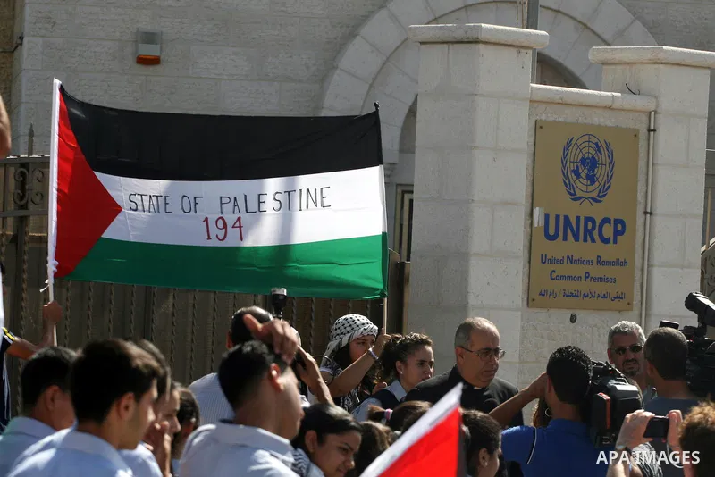 Palestinians march during a rally to support the Palestinian statehood bid in the United Nations, in the West Bank city of Ramallah, on Sept. 20, 2011. The Palestinians brushed aside heated Israeli objections and a promi...