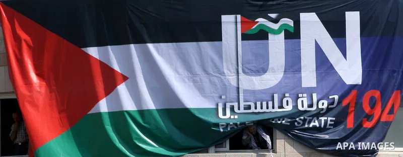 Palestinians participate in a rally in support of the Palestinian bid for statehood recognition in the United Nations, in the West Bank city of Ramallah, Wednesday, Sept. 21, 2011. Thousands of flag-waving Palestinians r...