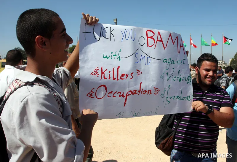 Palestinians school boys participate a demonstration in support of the Palestinian bid for statehood recognition in the United Nations in the West Bank city of Ramallah, Thursday, Sept. 22, 2011. Palestinian protesters h...