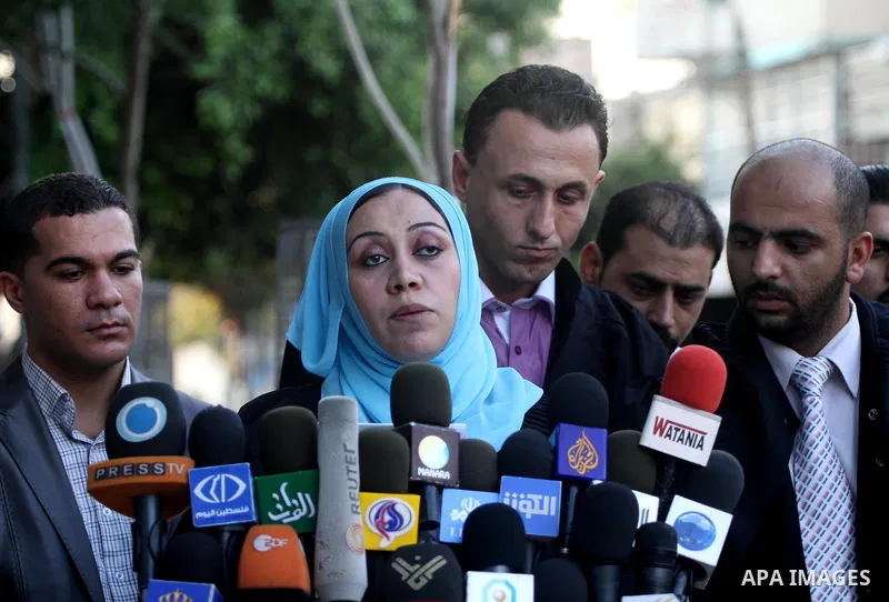 Palestinian lawyers take part in a press conference in support to President Mahmoud Abbas in Gaza city on Sep. 23,2011. Palestinian President Mahmoud Abbas is set to speak later Friday at the U.N., and plans to call on t...
