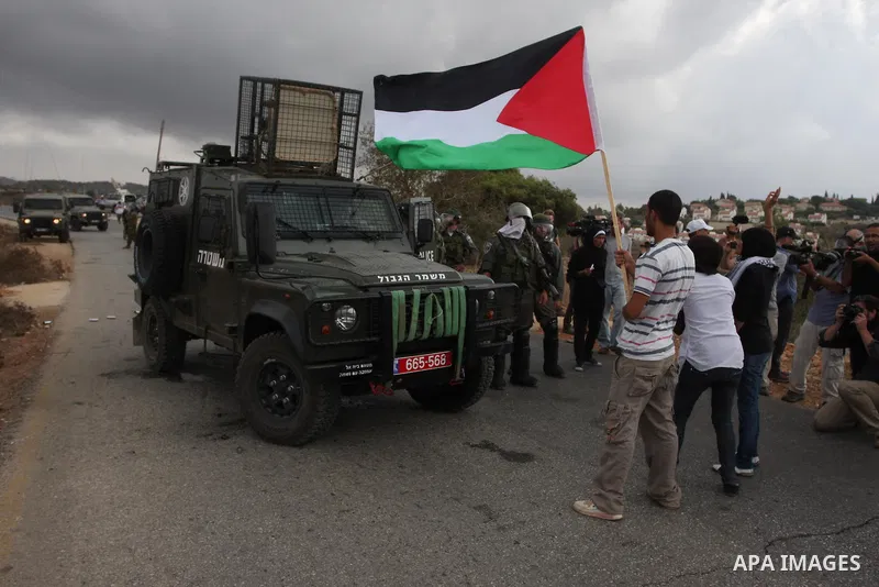 Israeli soldiers fire teargas during a clash with Palestinians in at a weekly protest in the West Bank village of Nabi Saleh, near Ramallah September 23, 2011. Israeli security forces were on high alert after Friday pray...