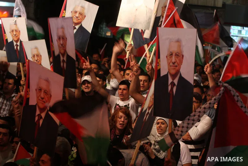 Palestinians attend a public screening of Palestinian President Mahmoud Abbas' speech at the United Nations, in the West Bank city of Ramallah September 23, 2011. Abbas asked the United Nations on Friday to recognize a s...