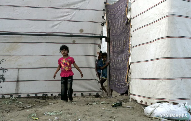 Palestinian children stand outside their houses in Rafah refugee camp, southern Gaza Strip on Sep. 24, 2011. Palestinian Authority President Mahmoud Abbas, hands over a formal letter to be admitted as a state to the UN S...