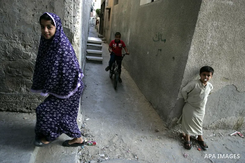 Palestinian children stand outside their houses in Rafah refugee camp, southern Gaza Strip on Sep. 24, 2011. Palestinian Authority President Mahmoud Abbas, hands over a formal letter to be admitted as a state to the UN S...