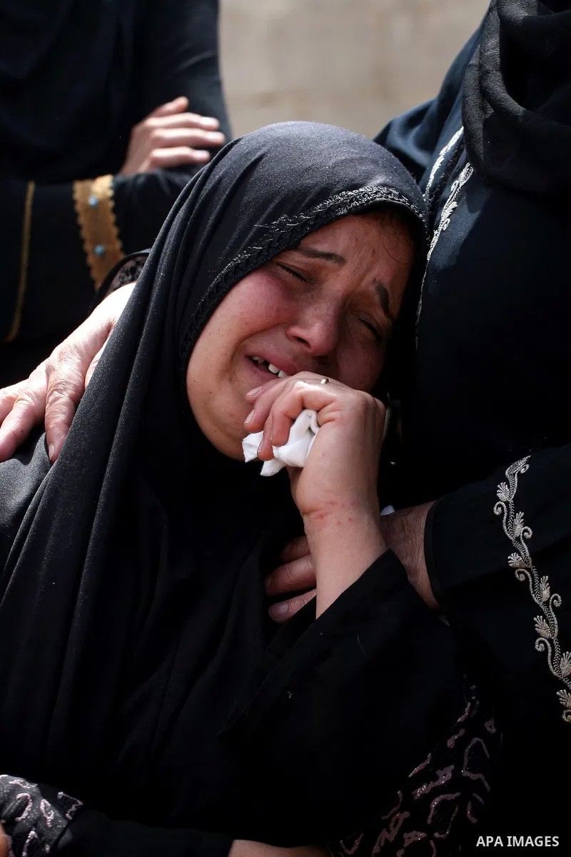 A Palestinian woman mourns during the funeral of Issam Badran in the West Bank village of Qusra near Nablus, on Sept. 24, 2011. Badran was shot dead Friday during a clash with Israeli soldiers and settlers. The shooting...