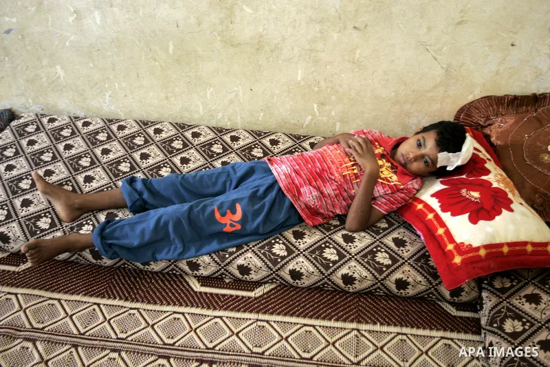A Palestinian student, Bashir Ghaydah was injured in his head while playing in a school grounds of the Relief and Works Agency refugees "UNRWA" in Rafah, southern Gaza Strip on Sep. 25, 2011. UNRWA refuses to provide tre...