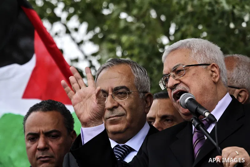 Palestinian President Mahmoud Abbas (Abo Mazen) addresses the crowd during a celebration in the West Bank city of Ramallah upon his return from the U.N. General Assembly in the U.S., on Sept. 25, 2011. Palestinians want...