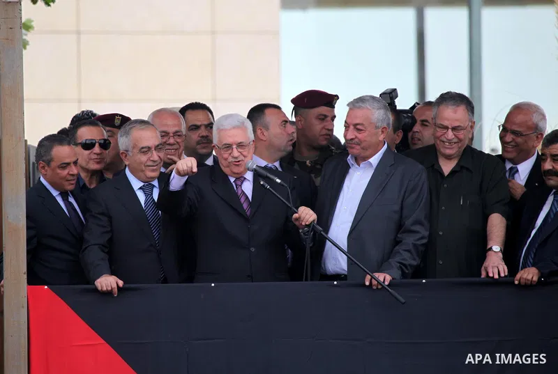 Palestinian President Mahmoud Abbas (Abo Mazen) addresses the crowd during a celebration in the West Bank city of Ramallah upon his return from the U.N. General Assembly in the U.S., on Sept. 25, 2011. Palestinians want...