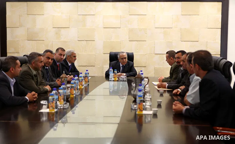Palestinian Prime Minister, Salam Fayyad during his meeting with the governing body of the Association of academics in the West Bank city of Bethlehem on Sep. 25, 2011. Photo by Mustafa Abu Dayeh