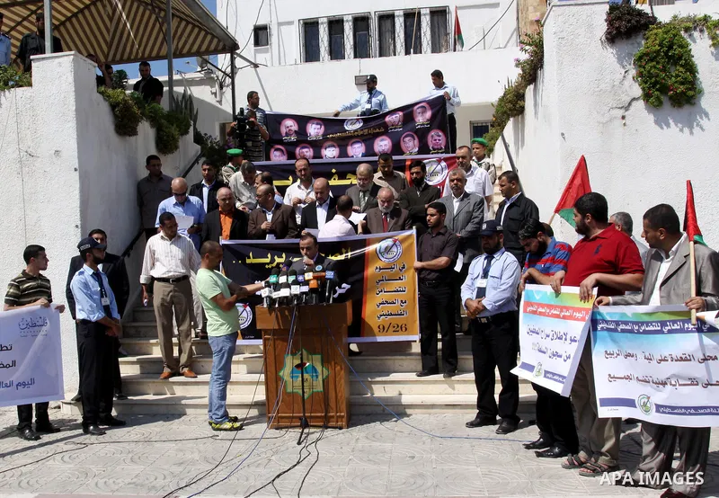 Memebers of the Palestinian journalist bloc and journalists deliver speech during the occasion of International Day in support with the Palestinian journalist, calling Ramallah government for the release of the detained...