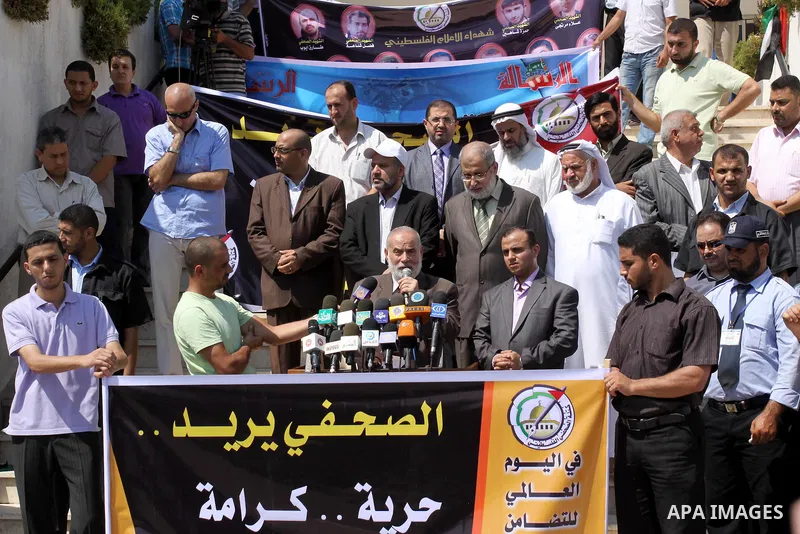 The spokesman of Hamas Parliament, Ahmed Bahar delivers speech during the occasion of International Day in support with the Palestinian journalist, calling Ramallah government for the release of the detained journalists...