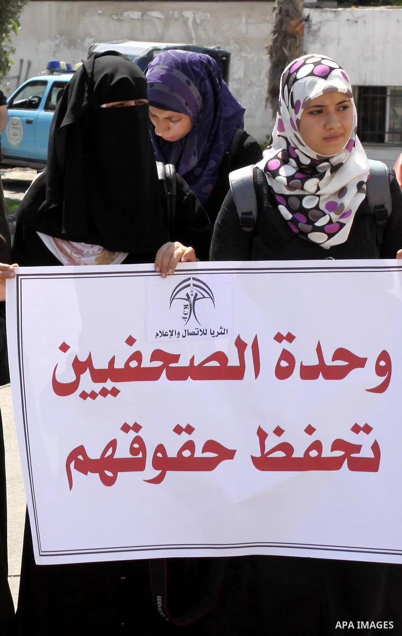 Memebers of the Palestinian journalist bloc and journalists take part on the occasion of International Day in support with the Palestinian journalist, calling Ramallah government for the release of the detained journalis...