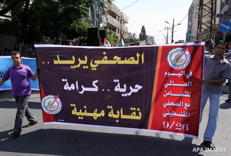 Memebers of the Palestinian journalist bloc and journalists take part on the occasion of International Day in support with the Palestinian journalist, calling Ramallah government for the release of the detained journalis...