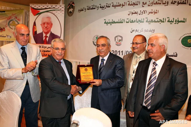 Palestinian Prime Minister, Salam Fayyad during the opening of the social responsibility of the Palestinian universities conference, where organized by Al-Quds Open University in the West Bank city of Nablus on Sept. 26,...