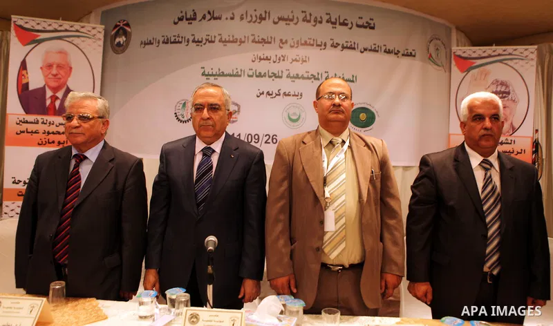 Palestinian Prime Minister, Salam Fayyad during the opening of the social responsibility of the Palestinian universities conference, where organized by Al-Quds Open University in the West Bank city of Nablus on Sept. 26,...